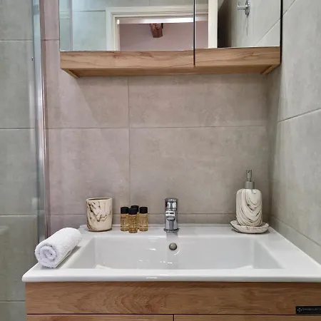 Alekos Cozy Stone 2br Karya Center