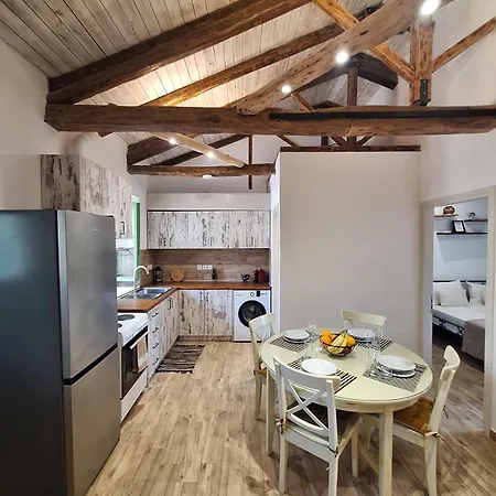 Alekos Cozy Stone 2br Karya Center