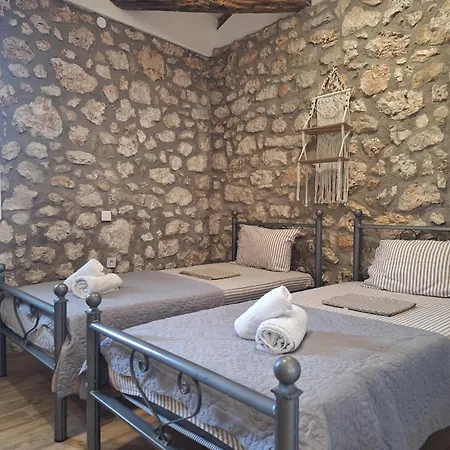 Alekos Cozy Stone 2br Karya Center
